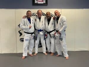 Ray Swanson receiving BJJ blue belt, November 2024